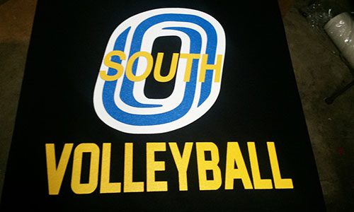 A close up of the words south volleyball