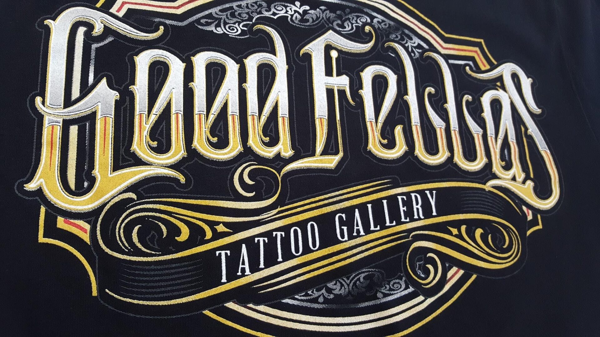 A sign that says good fellas tattoo gallery.